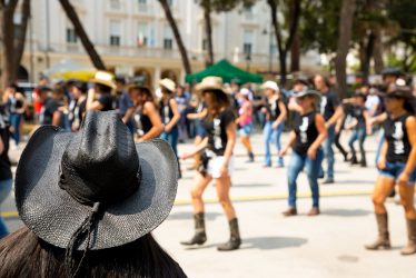 black-hat-on-flash-mob-background-2021-08-30-04-40-15-utc